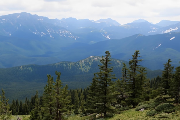 a mountain range with a mountain in the background