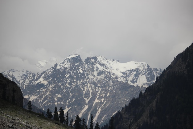 A mountain range with snow on the top