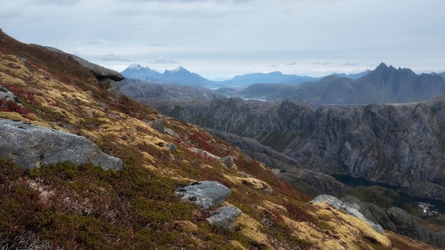 Mountain ridge above the town of Nusfjord in the Lofoten Islands, during a golden autumn