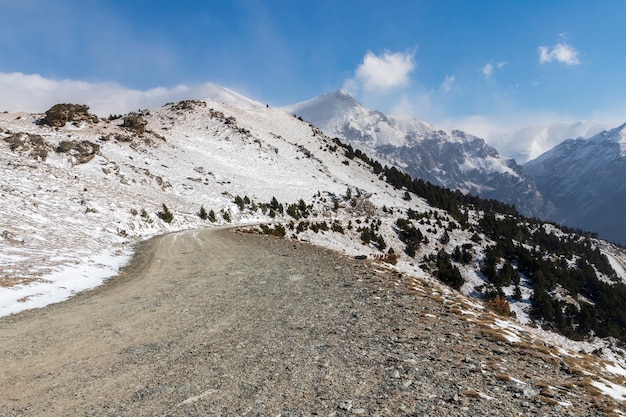 Mountain road covered in snow.