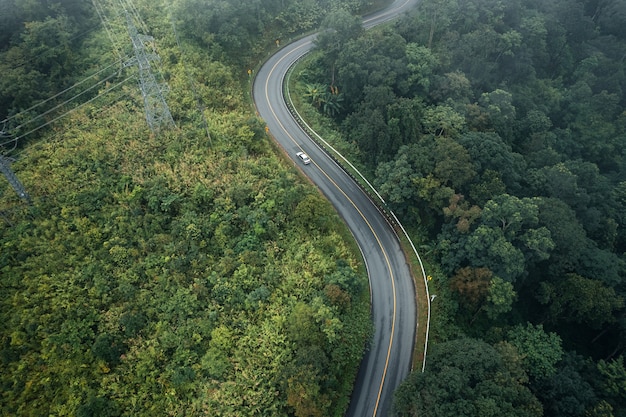 Mountain road in rainy and foggy day,Road to Pai