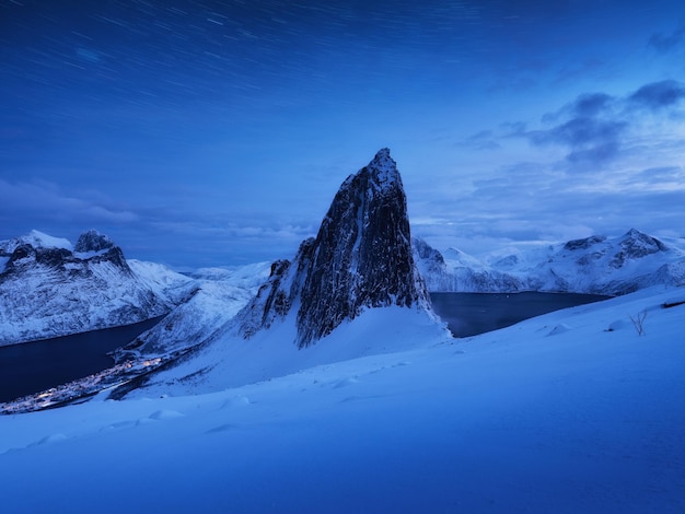 Mountain Segla and starry night sky Senja islands Norway High mountains at the winter time Winter landscape with night sky Norway travel image