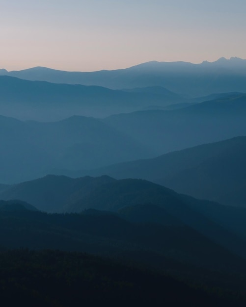 Mountain silhouettes layers in the sunset light