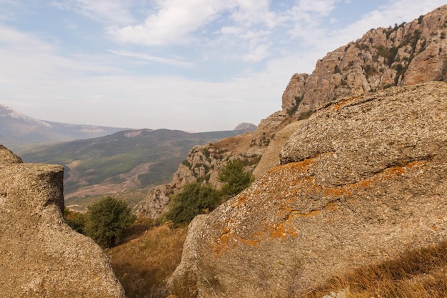 The mountain slope of the Demerdzhi massif View of the valley from the top of the trail