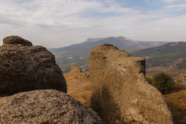 The mountain slope of the Demerdzhi massif View of the valley from the top of the trail