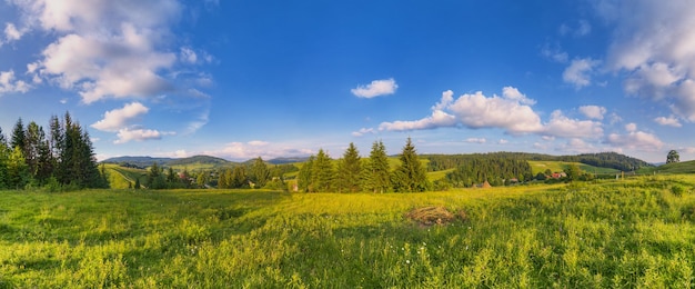 Mountain summer landscape with blue sky with clouds