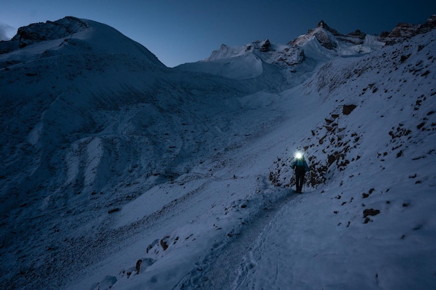 Mountain trekker is ascending on the Thorong La Pass Nepal