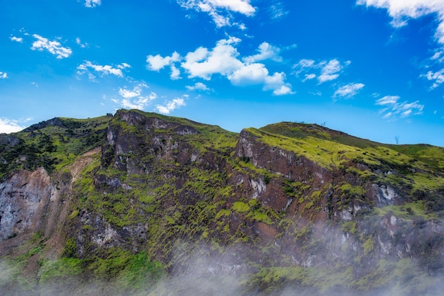 Mountain with fog on blue sky with cloud in the morning