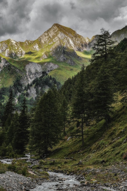 a mountain with a green mountain in the background