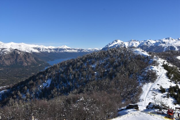 a mountain with a lake in the background