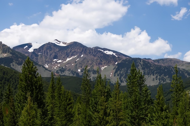 a mountain with a mountain in the background