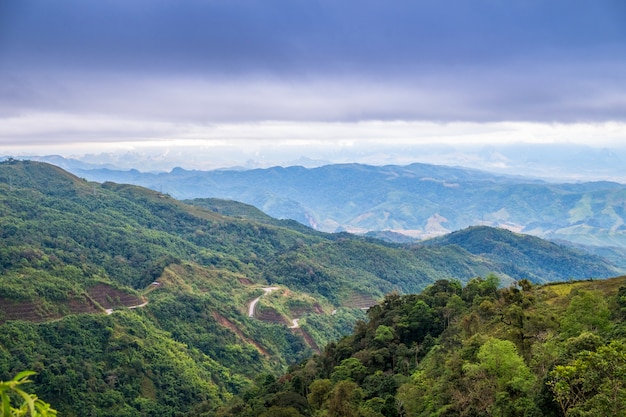 Mountain with sky scenery between the way 