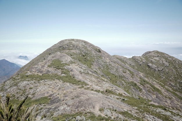 Mountaineer climbing brazil's highest peaks in the mountains with extensive hiking and backpacking.