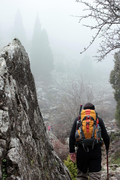 Mountaineer walking on an ancient road