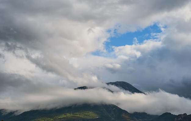 Mountains after a winter storm shrouded in clouds The beauty of the nature of the Aegean Sea in Turkey an idea for a background or screen