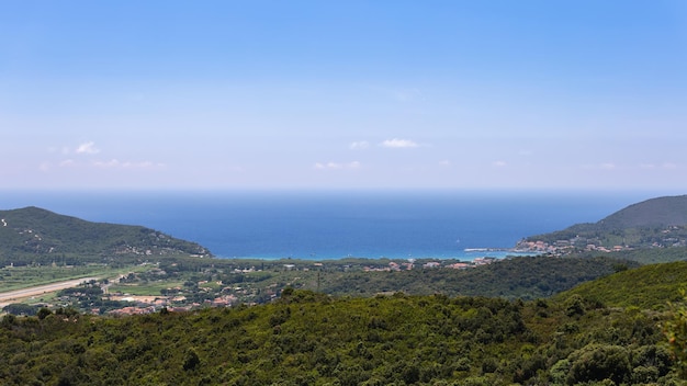 Mountains and blue waters of gulf Procchia in Province of Livorno, Island of Elba, Italy