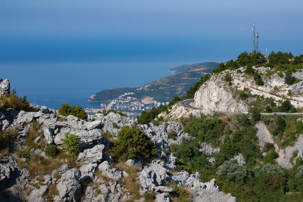 Mountains and cities along the road on the Adriatic coast in Montenegro in summer time