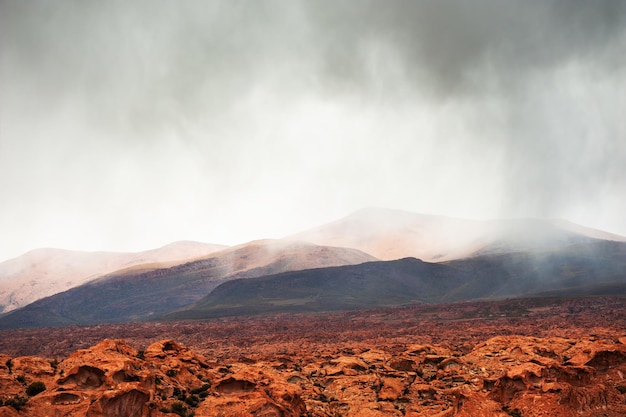 Mountains in the desert during the rain. Plateau Altiplano, Bolivia. South America landscapes