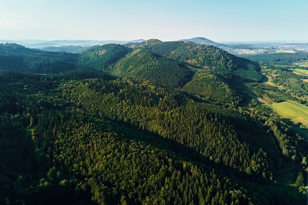 Mountains and green fields aerial view panorama of beautiful landscape