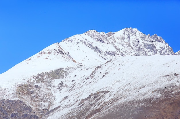 mountains snowy peaks background, landscape view winter nature peaks