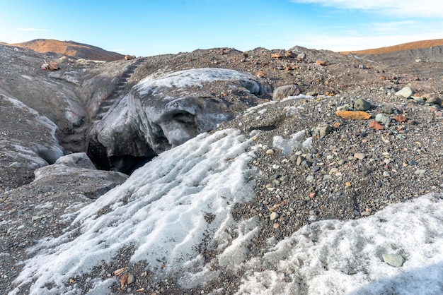 Mountains valleys and volcano around entrance of ice cave very famous landmark in Iceland travel