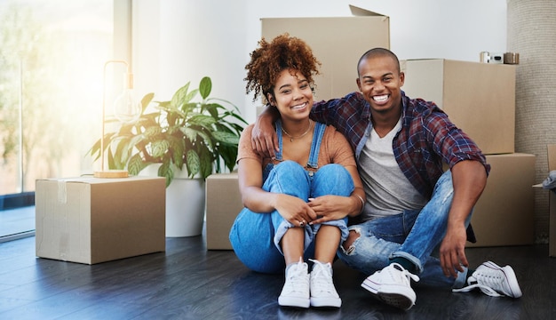 Moved out and moved in together Shot of an attractive young couple moving house