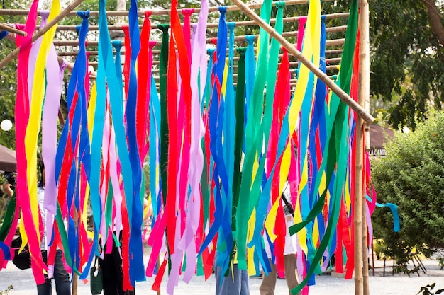 Movement and moving of colorful rainbow paper plate sheet at outdoor in garden of cafe and restaurant in bangkok Thailand