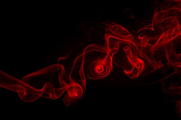 Movement of red smoke abstract on black background fire disign