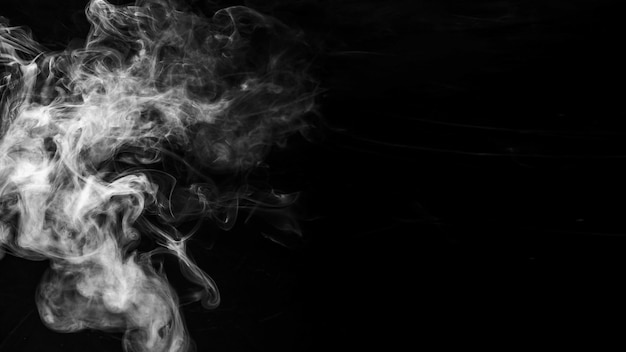 Photo movement of smoke on black background