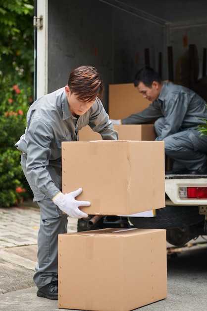 Movers Unloading Van