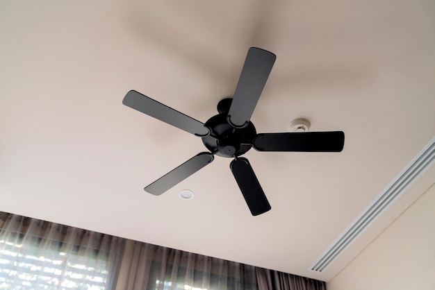 Moving ceiling fan in a hotel roomindoor hanging decorate ceiling fan install in bedroom hotel interior design