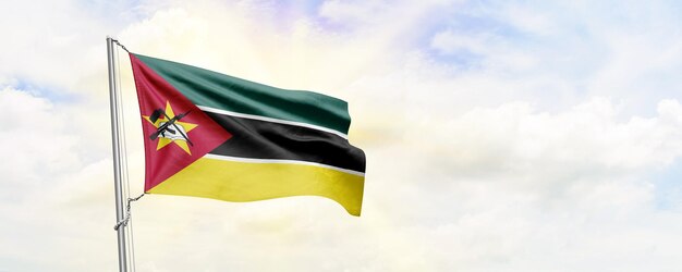 Mozambique flag waving on sky background 3D Rendering