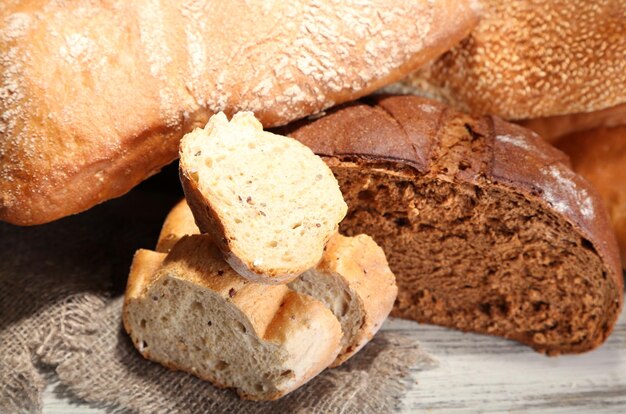 Much bread on sackcloth on wooden board