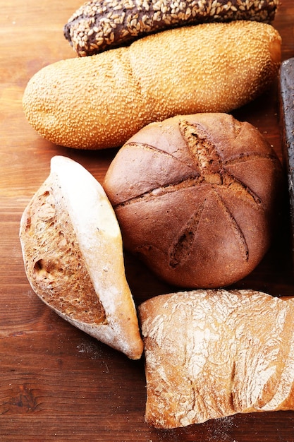 Much bread on wooden board