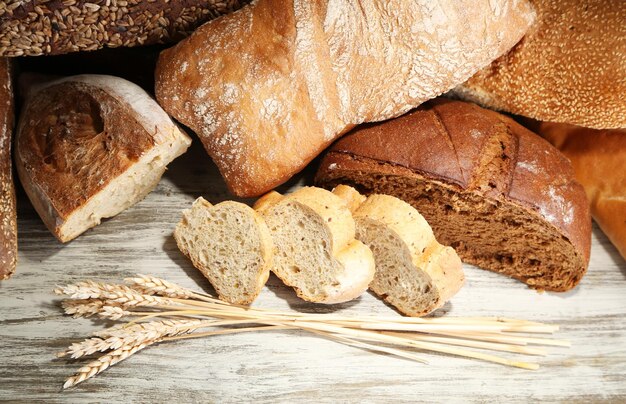 Much bread on wooden board