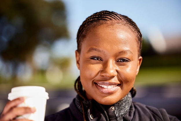 A much needed caffeine kick Shot of a young woman enjoying a cup of coffee