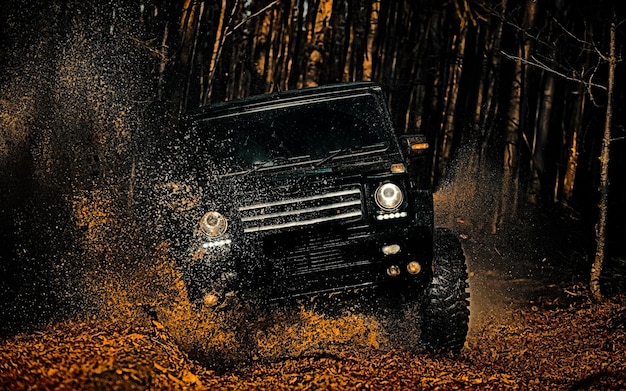 Mud and water splash in offroad racing offroad vehicle goes on the mountain jeep outdoors adventures...