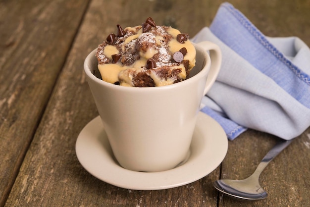 Mug cake with chocolate close up