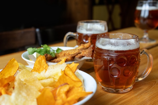 Mug with beer and beer snacks