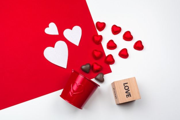 Mug with chocolate hearts. Flat lay composition. Romantic, St Valentines Day concept