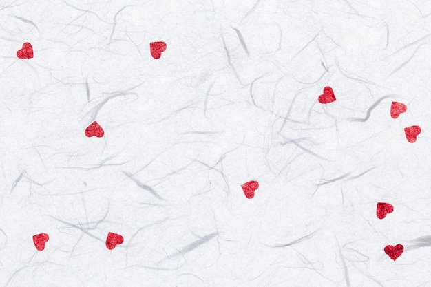 Mulberry paper with red hearts valentine background