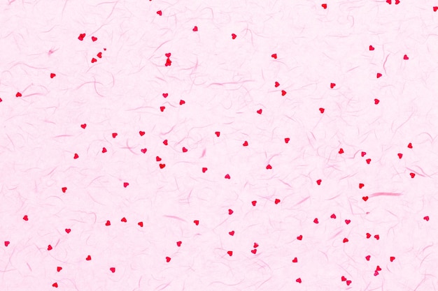 Mulberry paper with red hearts valentine background