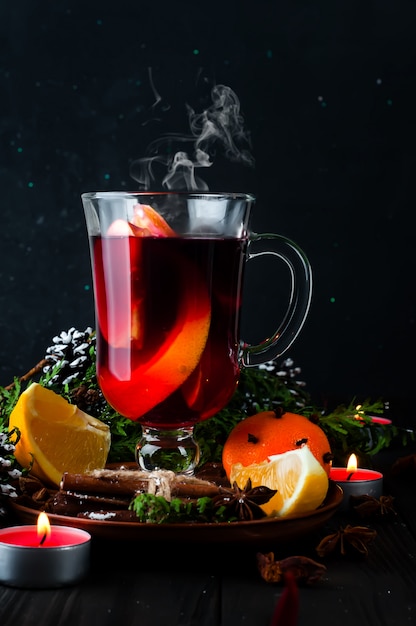 Mulled wine, tree branch and spices