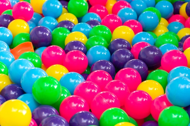 Multi color vibrant plastic ball in kids playing station.