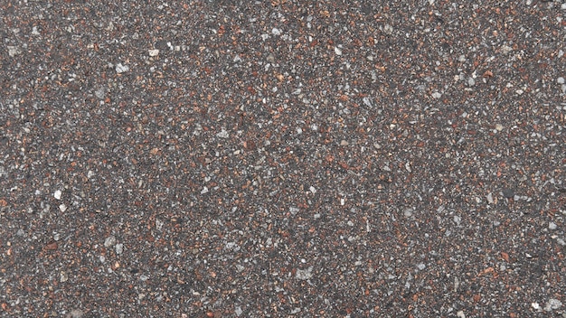 Multi colored asphalt structure. A lot of small rocks. Asphalt texture background wallpaper