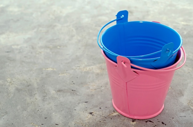 Multi-colored empty mini buckets