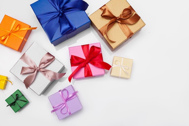 Multi-colored gift boxes with bow. Flatlay