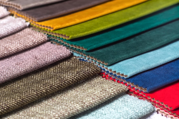 Multi colored set of upholstery fabric samples for selection collection of textile swatches