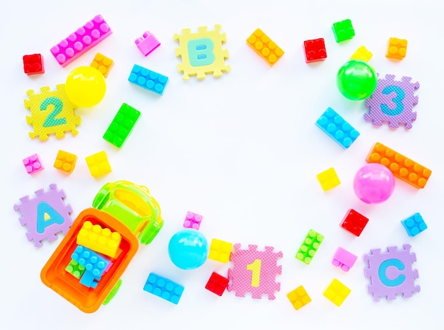 Multi colored toys on white background