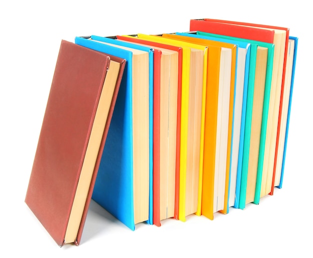 Multi-coloured books on a white background